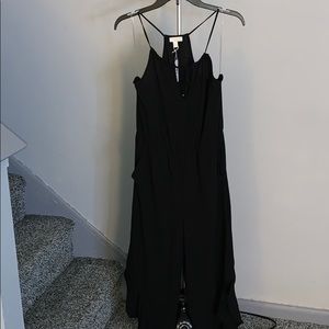 New! With tags Black romper with flowly pant legs